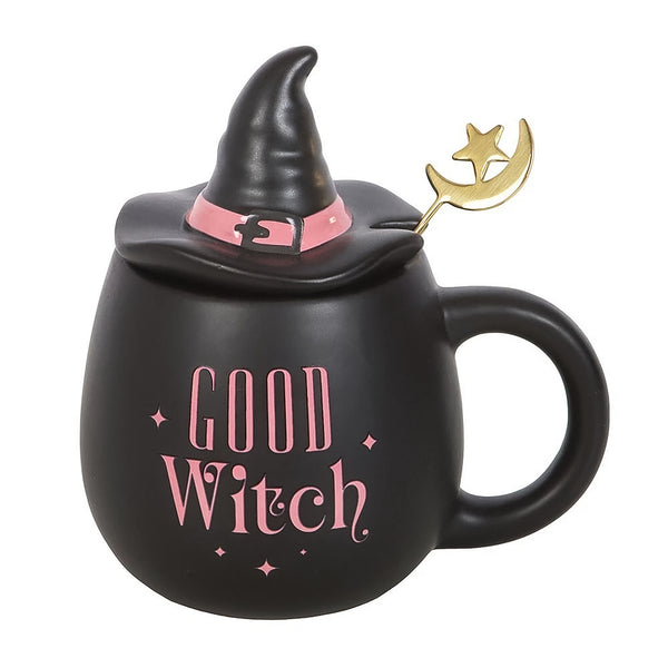 Black mug with witch hat lid and 'Good Witch' text on a white background