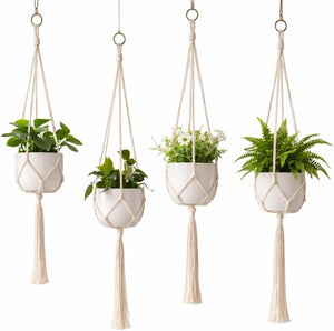 Four pack white macrame plant hangers.