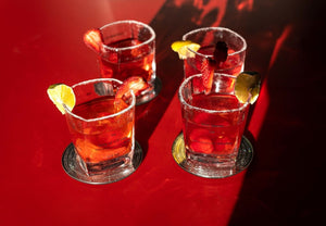 Four piece cocktail glass set with recipe booklet
