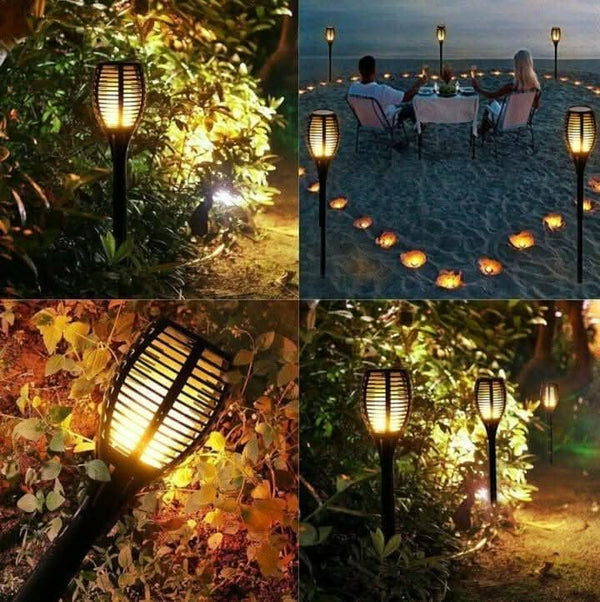 Solar dancing flame torch illuminated at night