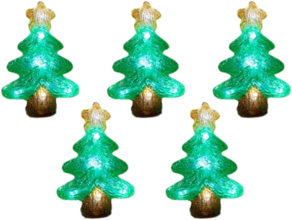 Set of LED Christmas tree lights on a stone surface with a rustic background.