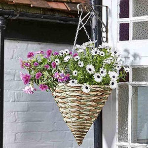 A cone-shaped hanging basket made from rattan effect material, with a silver metal chain, containing pink and white flowers.