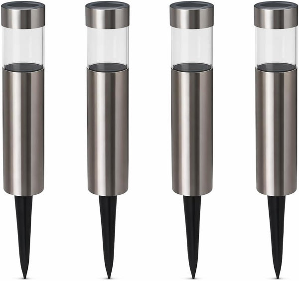 Four solar garden lights with brushed stainless steel bodies, clear glass upper sections, and black ground stakes, shown on a plain white background.