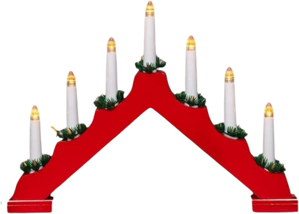 Red wooden Advent wreath with white candles on a white background