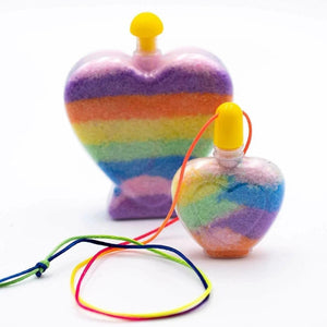 Colorful heart-shaped fidget spinner with a yellow top on a white background