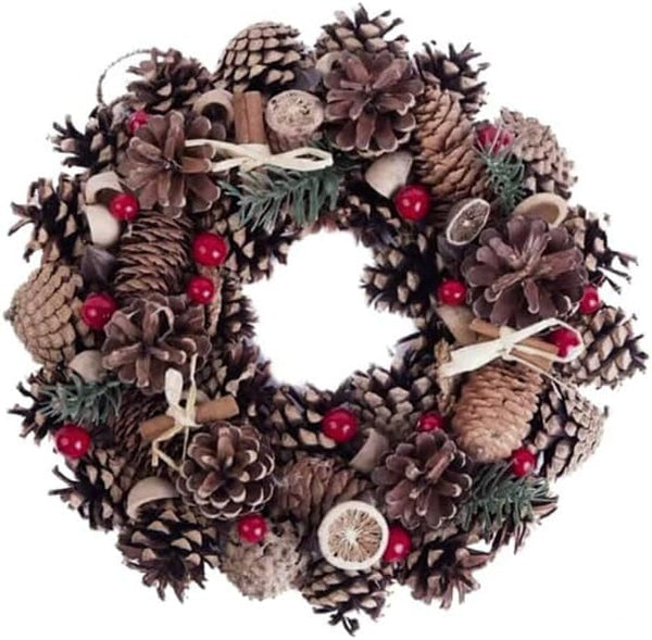 Decorative wreath with pinecones, berries, and other natural elements on a white background