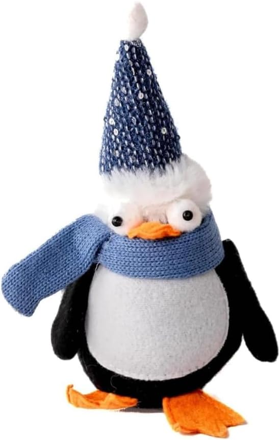 Decorative penguin ornament with a blue scarf and hat on a white background.