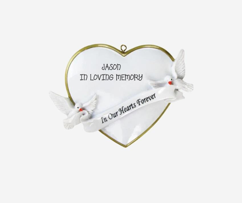 Heart-shaped with two white doves and engraved text on a white background