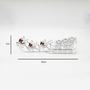 Decorative metal sleigh with reindeer on a white background
