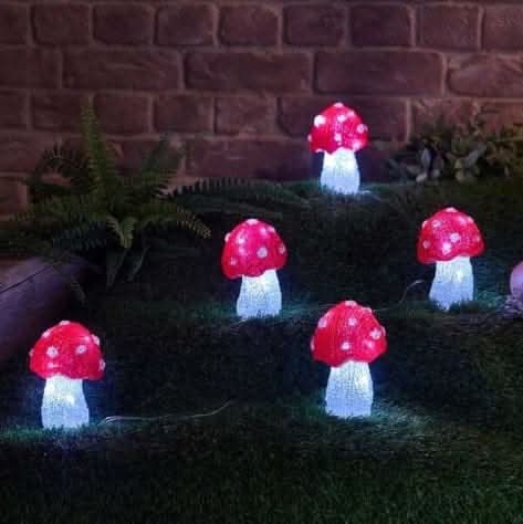 Five solar mushroom garden stake lights with cool white LEDs