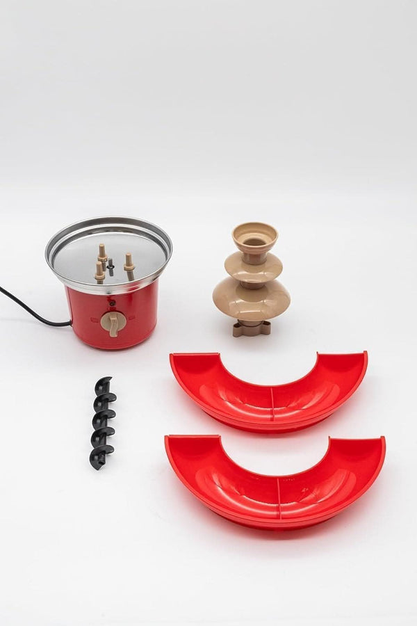 Red and gold kitchen appliance parts on a white background