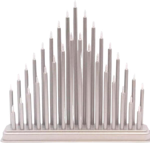 Decorative candle holder with multiple candles on a white background