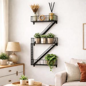 Black metal wall shelf with decorative items in a living room setting