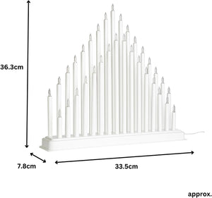 White candle holder with candles, showing dimensions on a white background