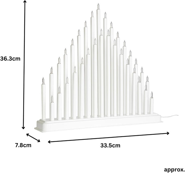 White candle holder with candles, showing dimensions on a white background