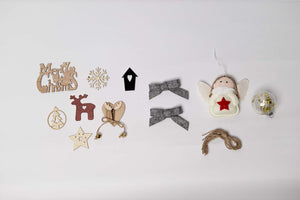 Collection of Christmas-themed decorative items on a white background