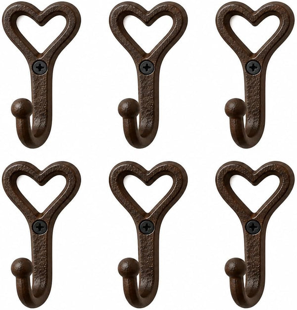 Six dark brown cast iron heart-shaped coat hooks arranged in two rows of three on a plain white background.