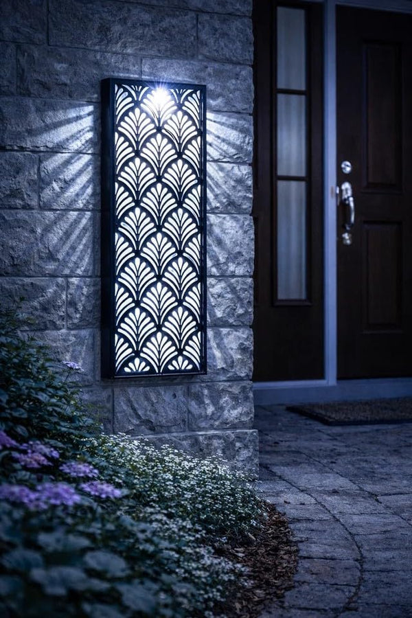 Decorative outdoor light fixture on a stone wall with a door in the background