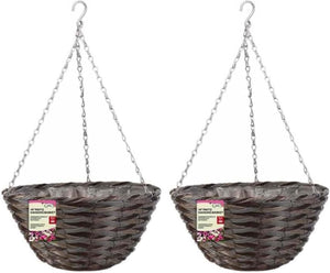 Two wicker hanging planters with chains on a white background