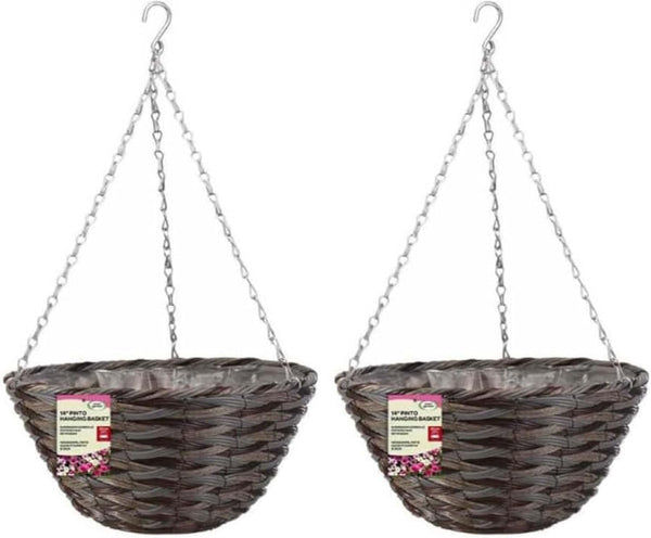 Two wicker hanging planters with chains on a white background