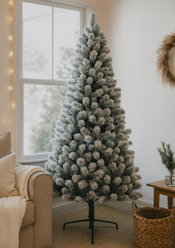 Six foot artificial tree with snowy finish