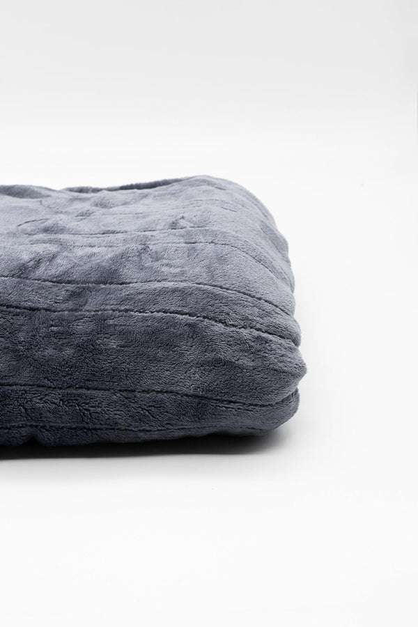 Gray weighted blanket on a white background