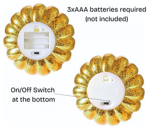 Two decorative night lights with gold and white design, showing an on/off switch.