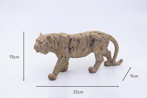 Tiger figurine with measurements on a white background