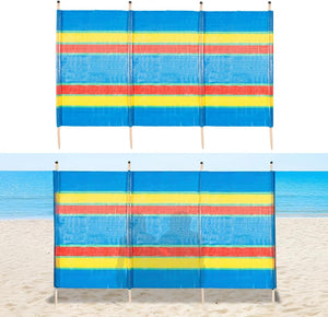 Colorful striped beach screen with blue, yellow, and red stripes on a sandy background.