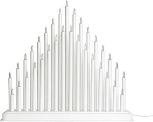 White candle-like lamp with multiple vertical lights on a white background
