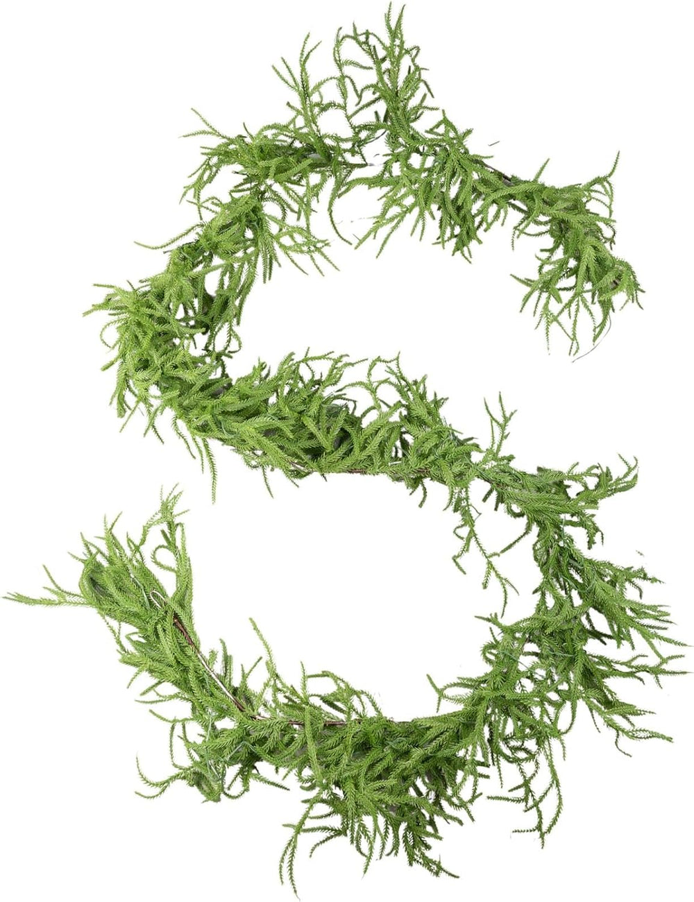 Decorative green garland with lights on a fireplace mantel.