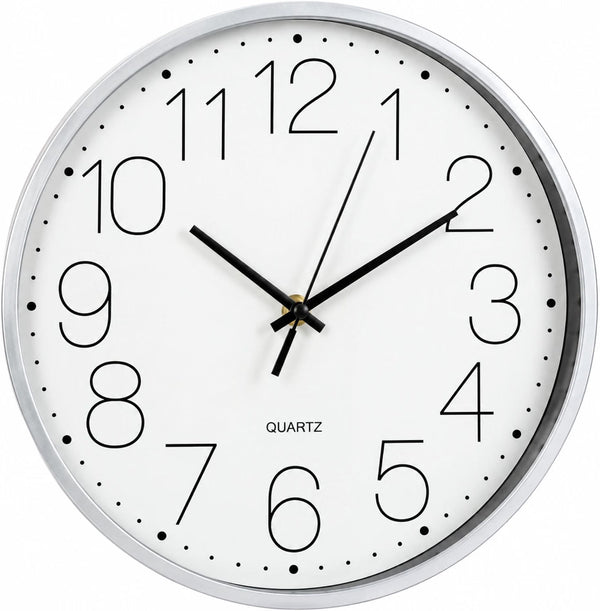 A minimalist quartz wall clock with a white face, black Arabic numerals, black hands, and a polished silver metal frame, shown against a plain white background.
