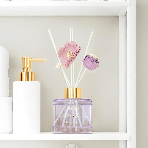 Decorative diffuser with floral elements on a shelf