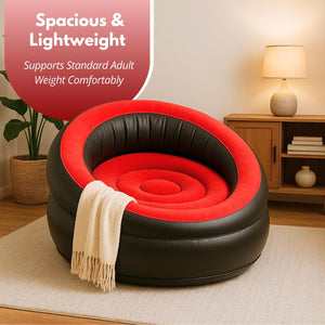 Black and red inflatable chair in a living room setting with text about its weight capacity.