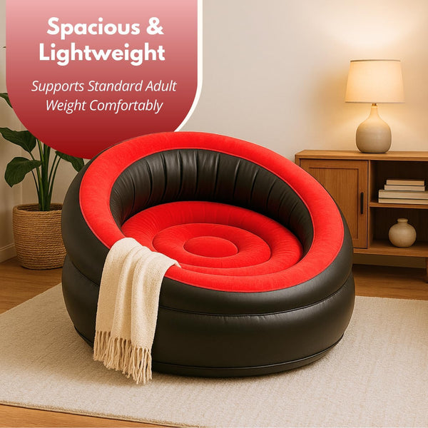 Black and red inflatable chair in a living room setting with text about its weight capacity.