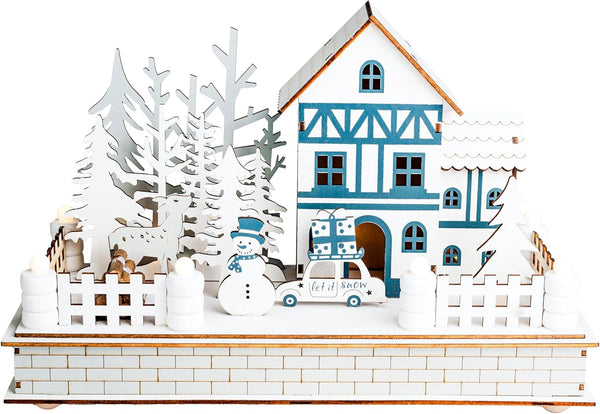 Wooden model of a house with decorative elements on a white background