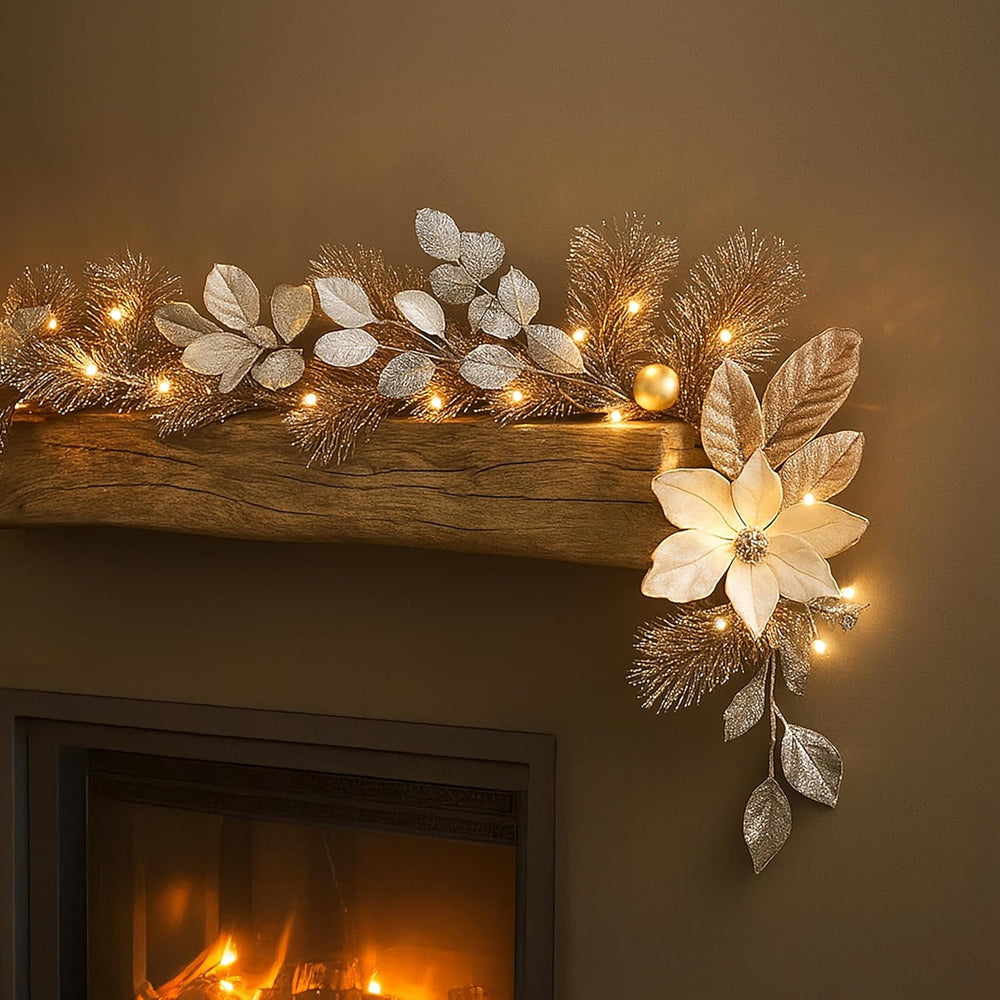 Decorative floral garland with lights on a mantelpiece above a fireplace.