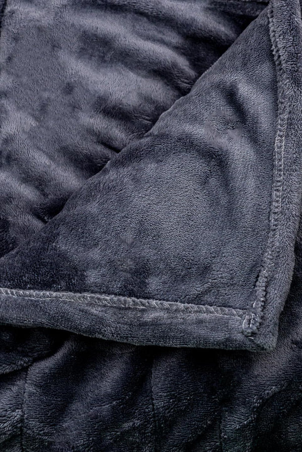 Close-up of a textured dark blue fabric