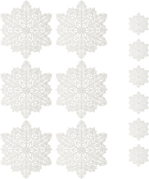 White decorative snowflake decals arranged on a white background, with larger snowflakes on the left and smaller ones along the right side.