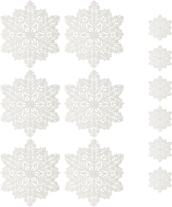 White decorative snowflake decals arranged on a white background, with larger snowflakes on the left and smaller ones along the right side.