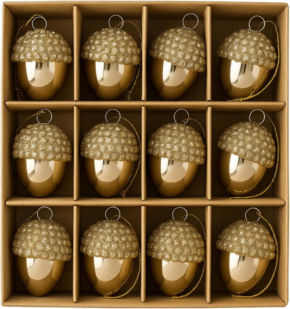 Gold acorn-shaped ornaments on a Christmas tree
