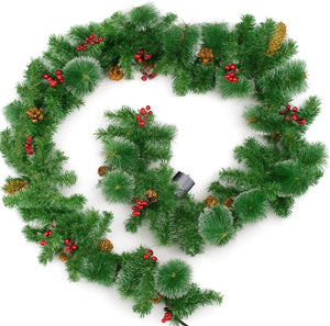 Decorative Christmas wreath with green pine needles, red berries, and pinecones on a white background