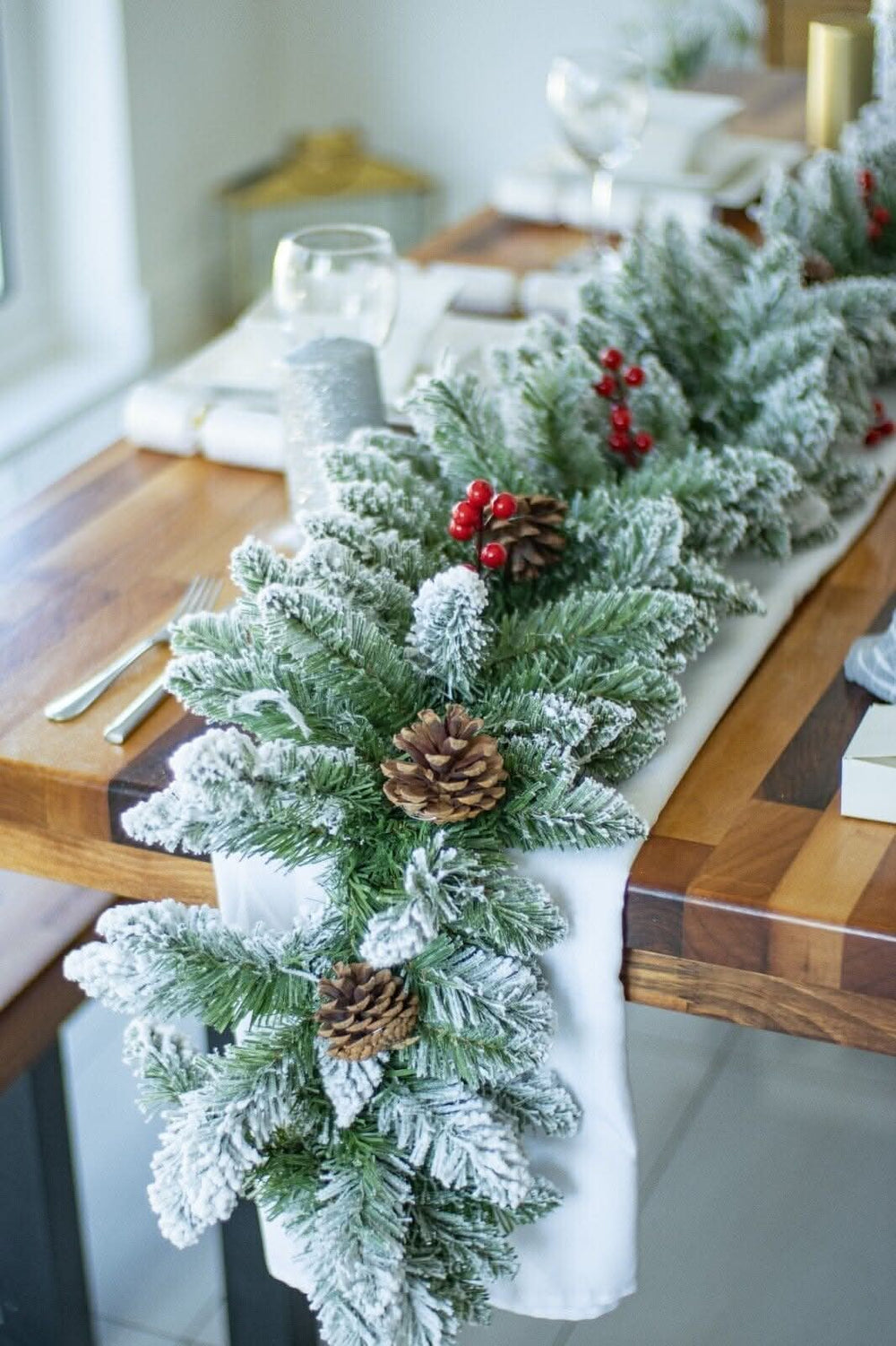 9ft snow dusted Christmas garland with red berries