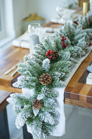 9ft snow dusted Christmas garland with red berries
