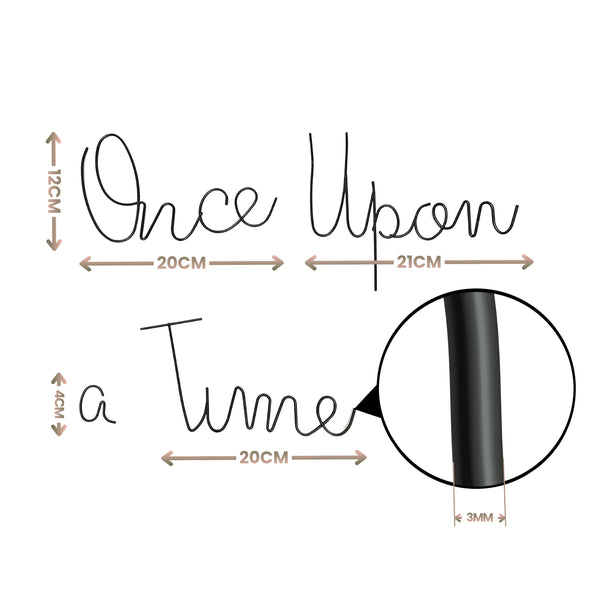 A black cursive wall decal reading 'Once Upon a Time' with dimension annotations showing the size of the letters, the full word length, and a magnified section of the black script.