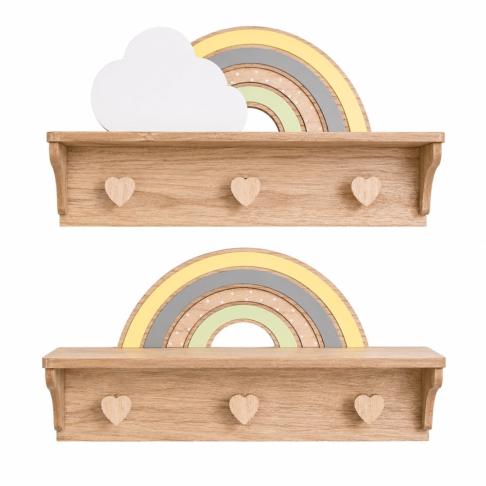 Two light natural wood wall shelves styled in a nursery setting, decorated with a wooden rainbow, a white cloud cutout, a small potted plant, a plush bunny toy, and heart-shaped peg hooks.