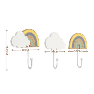 Three wall hooks shaped like clouds with rainbow accents, shown on a white background with dimension arrows and labels indicating 12cm, 10cm, and 10cm width plus 12.5cm height.