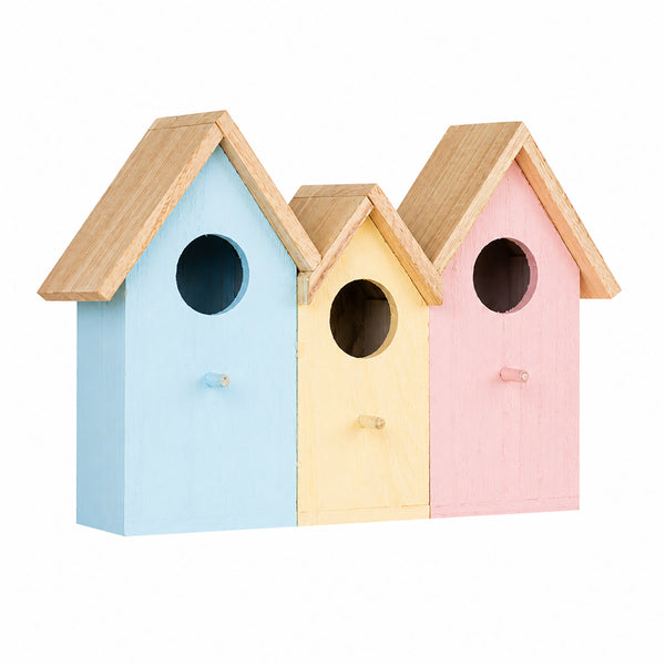Three small wooden birdhouses in pastel blue, yellow, and pink, arranged side by side against a plain white background.