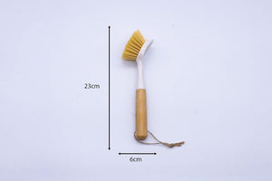 Brown and white bamboo washing brush close up