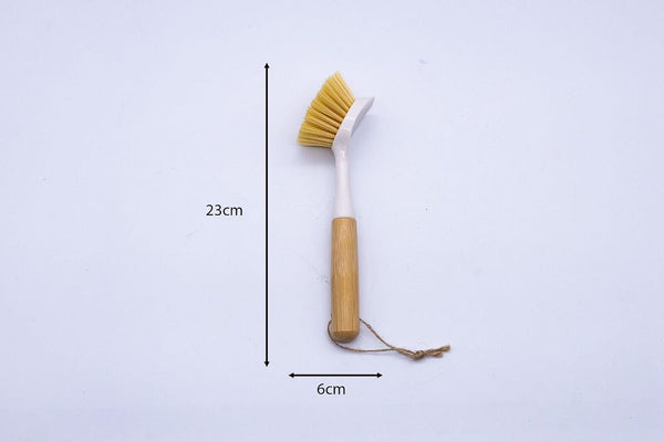Brown and white bamboo washing brush close up